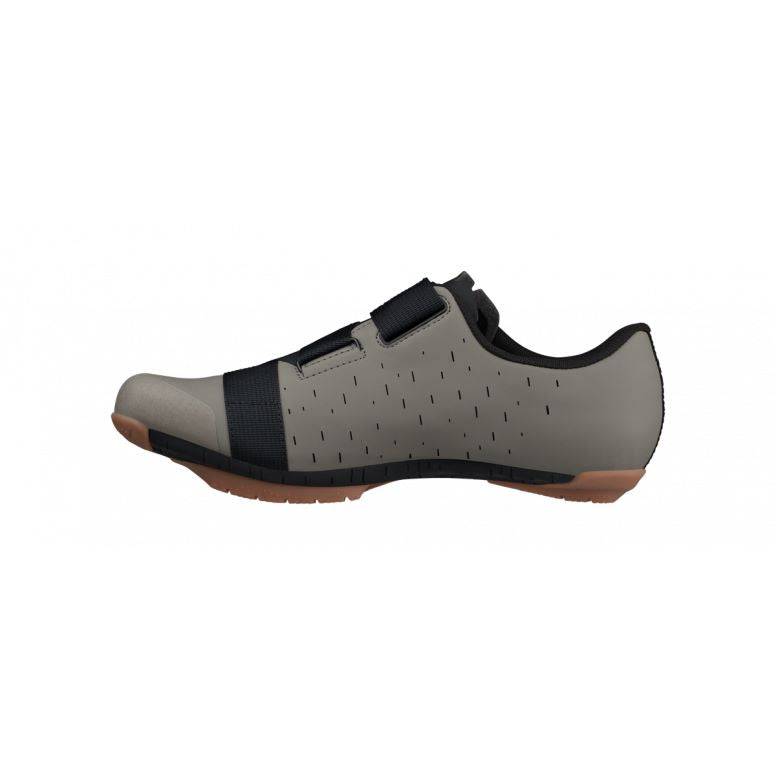 Fizik X4 Terra Powerstrap gravel cycling shoes with adjustable fit and durable outsole, shown from a side angle.