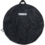 Thule 563 Wheel Bag XL for bike wheels up to 29 inches, showing padded exterior and internal pocket for accessories.