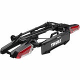 Thule OutPace 9012200 2-bike towball carrier with 13-pin connector, durable bike transport accessory, mounted on vehicle.