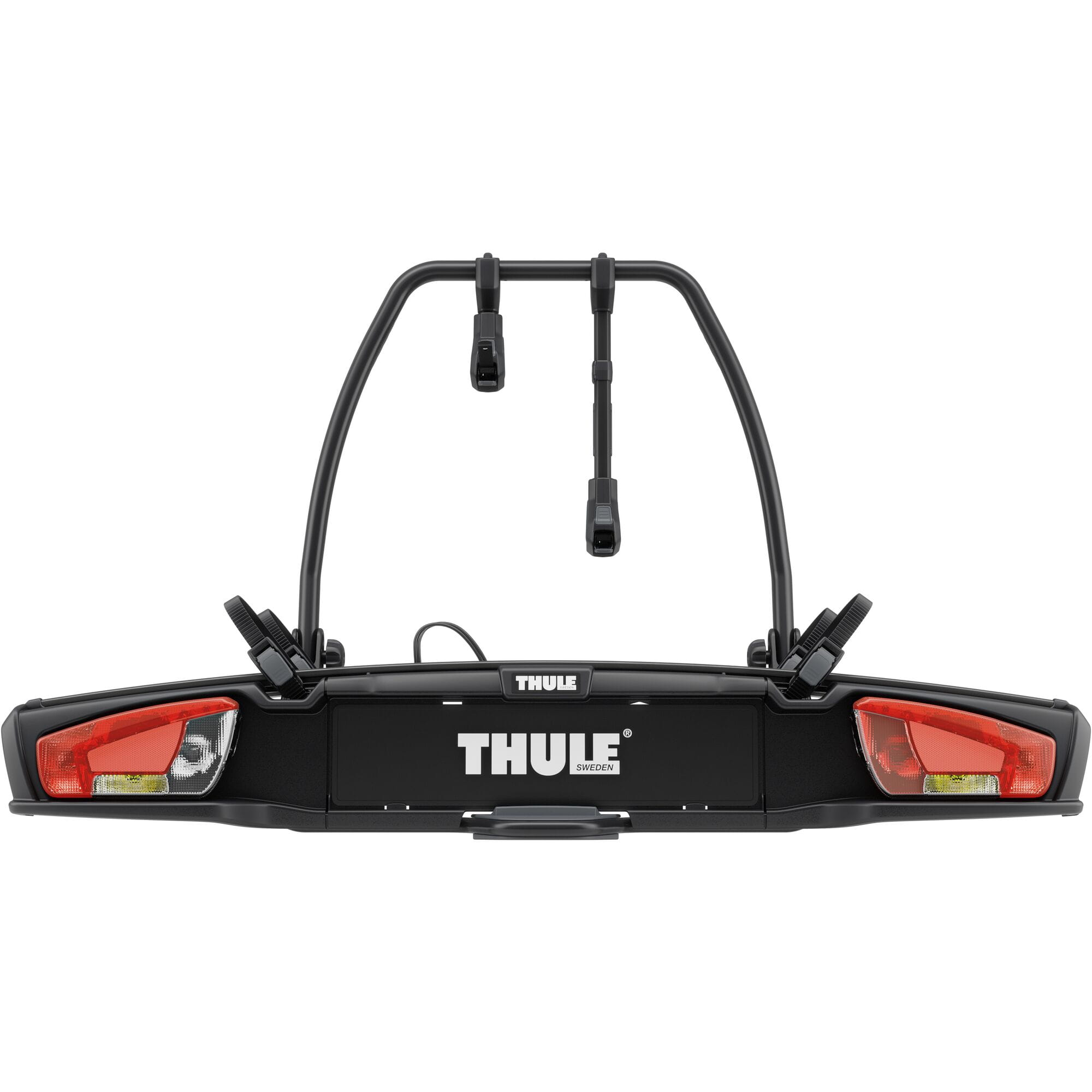 Thule VeloSpace 3 2-bike towball carrier with 13-pin connector for e-bikes, shown attached to a vehicle.