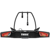 Thule VeloSpace 3 2-bike towball carrier with 13-pin connector for e-bikes, shown attached to a vehicle.