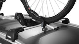 Thule Wheel Strap Locks for bike carriers with secure plastic straps and 2 included adaptors, designed for safe bike transport.