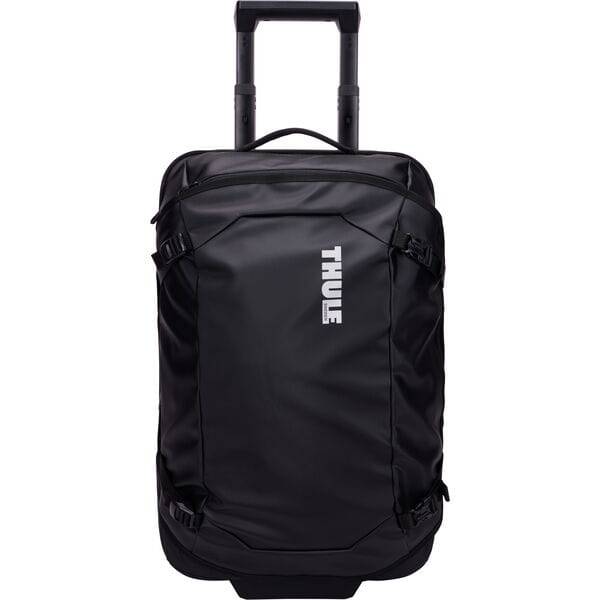 Black Thule Chasm Carry On wheeled suitcase with durable design and oversized wheels, ideal for travel and accessories.