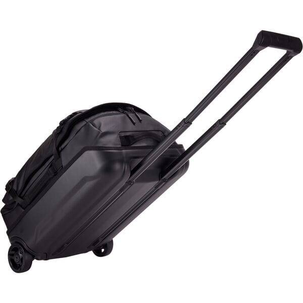 Black Thule Chasm Carry On wheeled suitcase with durable design and oversized wheels, ideal for travel accessories.