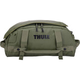 Thule Chasm Recycled 30L Duffel Bag with convertible backpack straps, showing durable green fabric and carry handles.