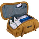 Thule Chasm Recycled 30L duffel bag with convertible backpack straps, showing the durable, eco-friendly design and spacious interior.