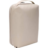 Thule Chasm Medium Gear Cube Soft Sand weather-resistant organizer bag with multiple compartments for accessories.