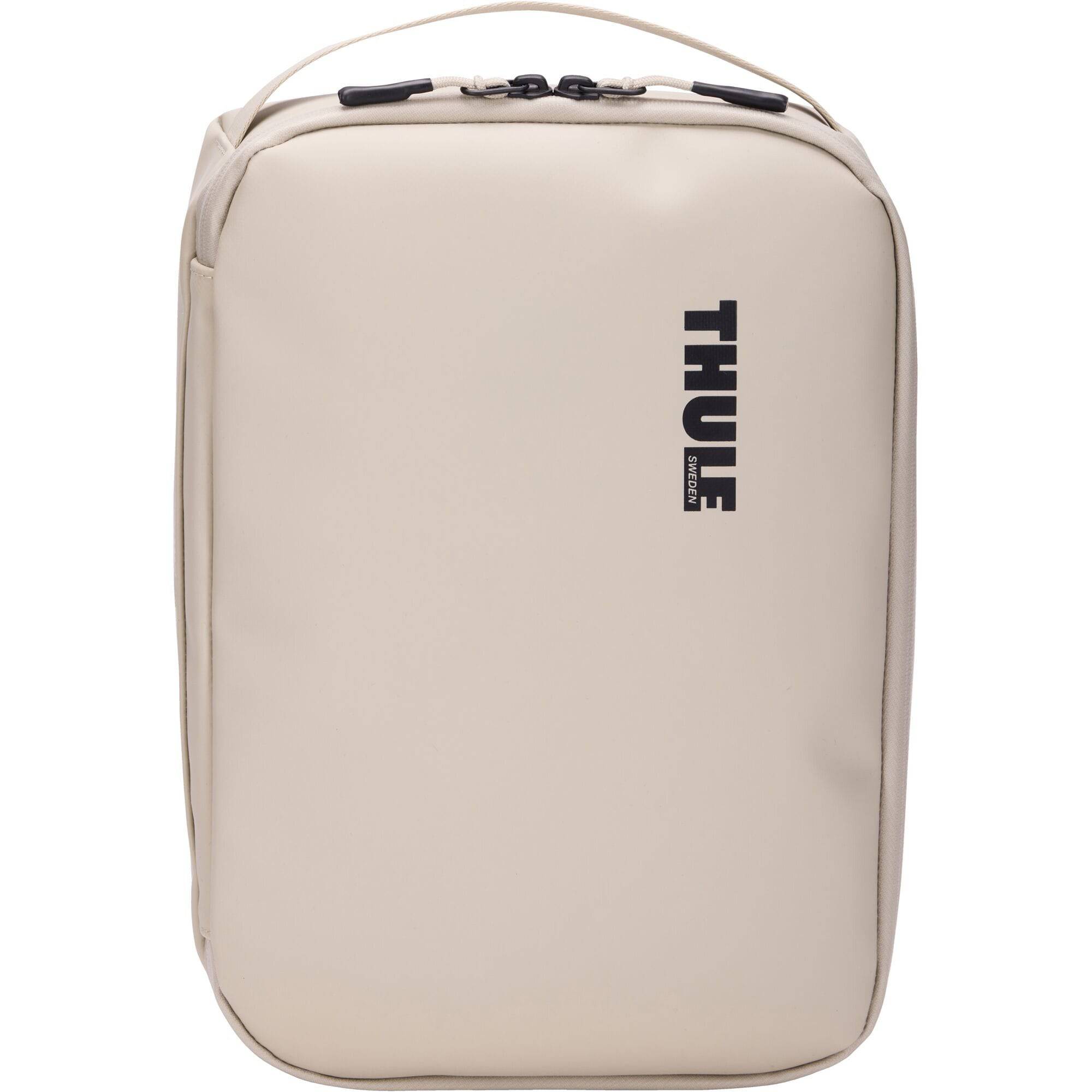 Thule Chasm Medium Gear Cube Soft Sand weather-resistant organizer bag with multiple compartments for accessories.