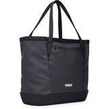 Thule Chasm Gear Tote 30L outdoor gear bag with durable water-resistant fabric and reflective trim, accessories category.