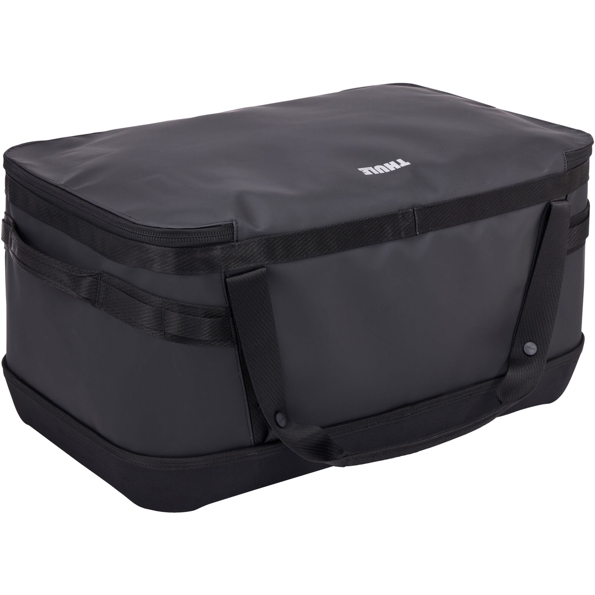 Thule Chasm Gear Hauler waterproof semi-rigid storage bag for travel and camping accessories, shown in a camping setting.