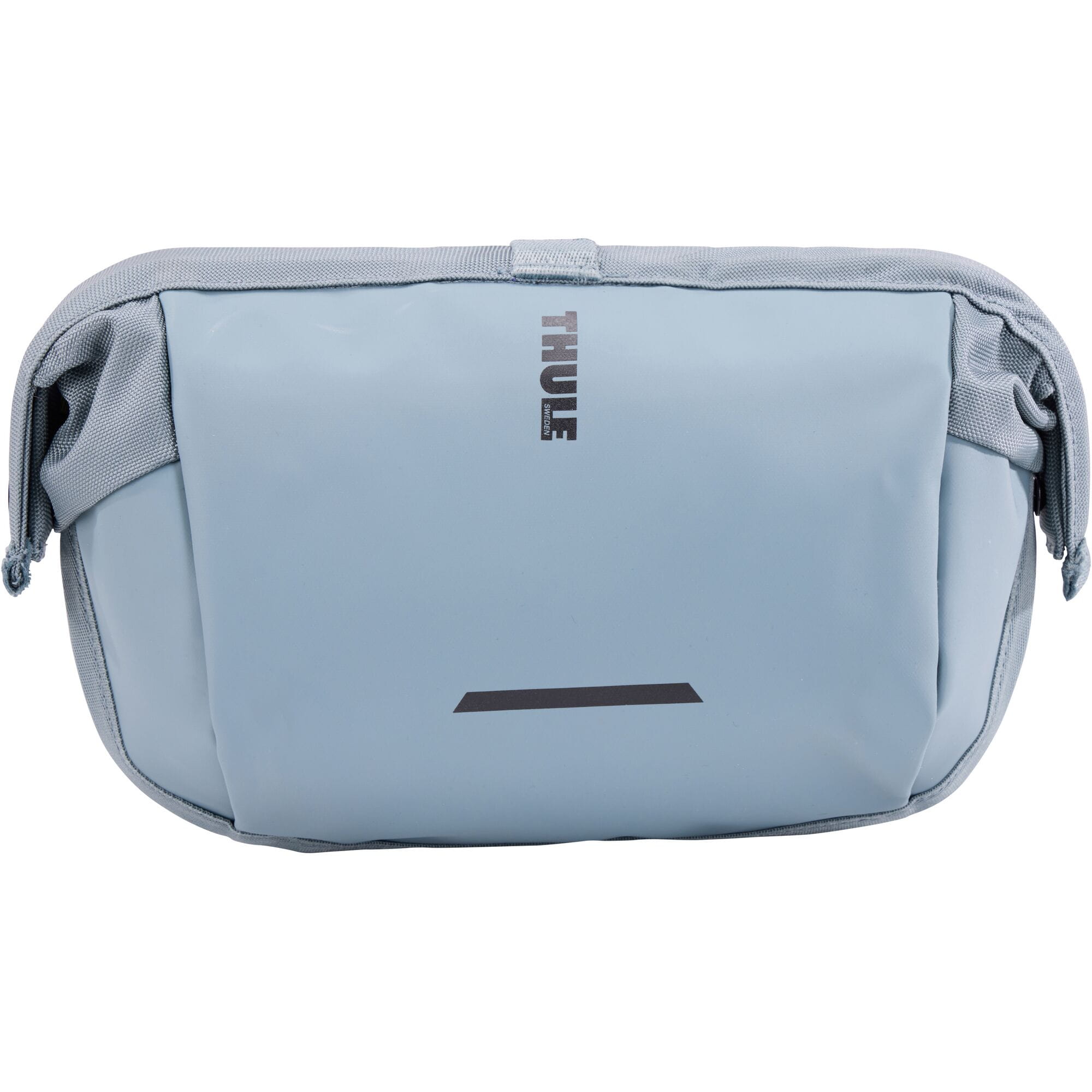 Thule Chasm Handlebar Bag 2L with removable pouch and water-resistant design, mounted on a bicycle handlebar.