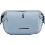Thule Chasm Handlebar Bag 2L with removable pouch and water-resistant design, mounted on a bicycle handlebar.
