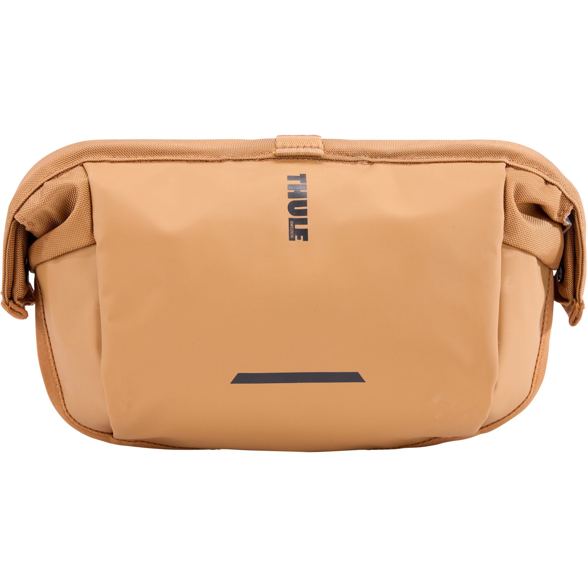 Thule Chasm 2L handlebar bag with removable pouch, water-resistant design, mounted on a bicycle handlebar.