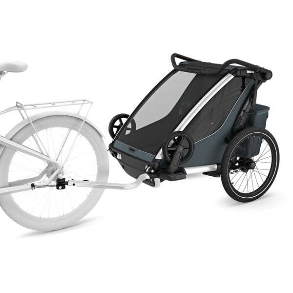 Thule Chariot Cross 2 double child carrier with cycling and strolling kits, featuring a sturdy frame and padded seats.