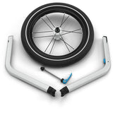 Thule Jogging Kit front wheel attachment for Chariot Cross 2 stroller, designed for outdoor jogging activities.