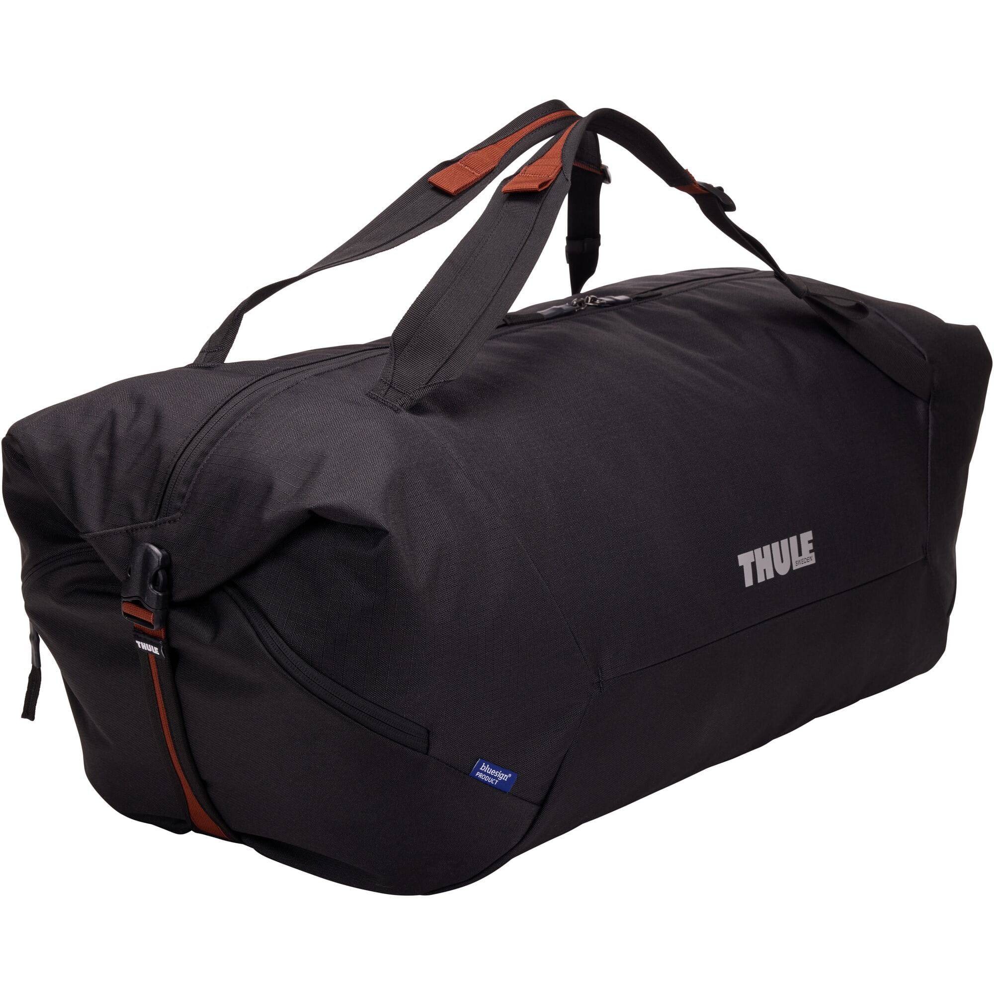 Black Thule GoPack Duffel Set 4-Pack with backpack conversion, showing versatile travel bags with handles and adjustable straps.