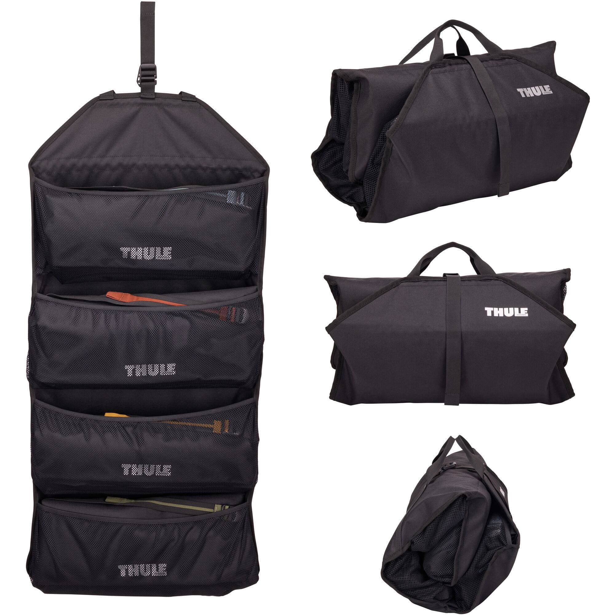Thule GoPack Duffel Set 4-Pack with backpack conversion in black, featuring multiple travel bags and adjustable straps.