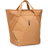 Thule Chasm Tote InLock 25L water-resistant bike rack-compatible tote bag with sturdy handles and compact design.