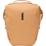 Thule Shield 22L waterproof bike pannier with laptop compartment and InLock system, designed for secure cycling accessories.