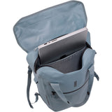 Thule Shield 23L waterproof backpack with InLock bike rack attachment, showing secure straps and durable outdoor gear design.