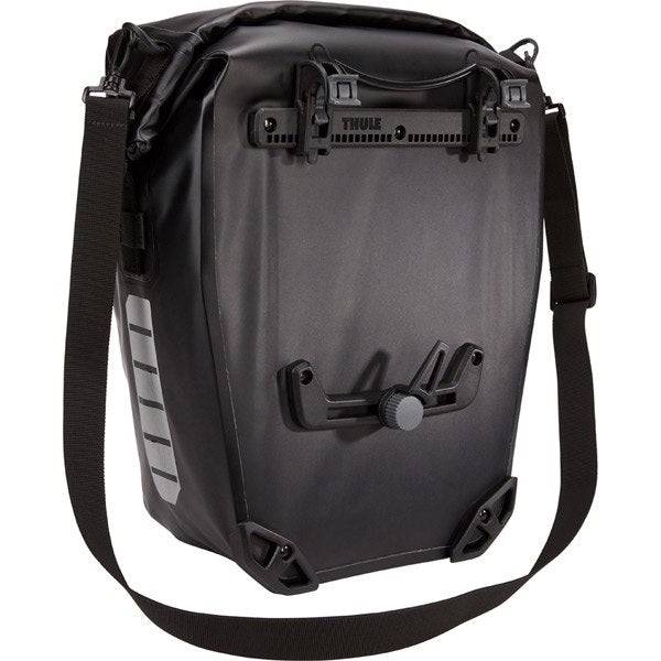 Thule Shield waterproof panniers with reflective panels and adjustable mounts for bike accessories.