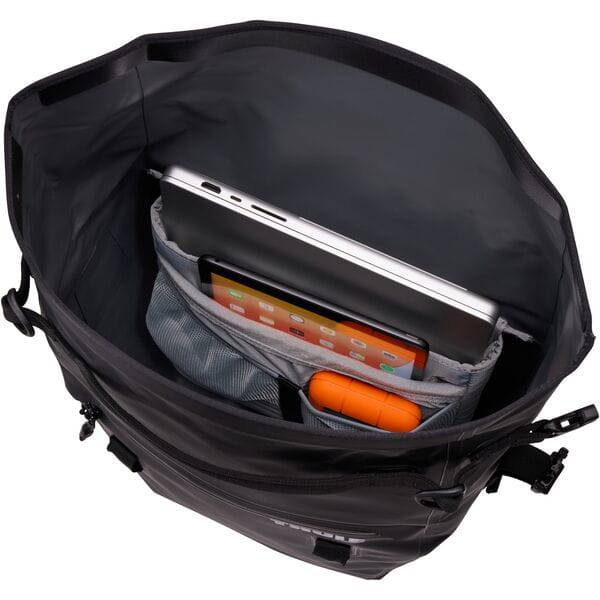 Thule Shield Commuter Pannier 22L waterproof black bike bag with laptop sleeve, designed for daily commuting accessories.