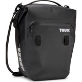 Thule Shield Commuter Pannier 22L waterproof black bag with laptop sleeve, designed for cycling accessories.