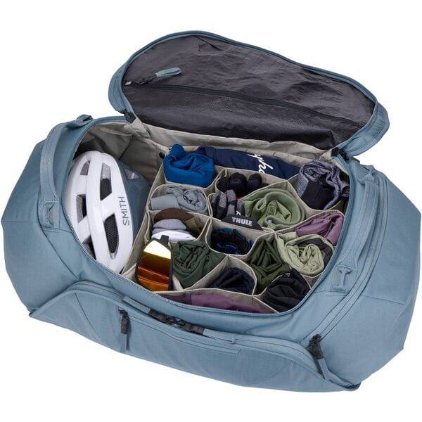 Thule RoundTrip Bike Duffel 55L cycling gear bag with organized compartments and durable carry handles.