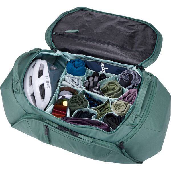 Thule RoundTrip Bike Duffel 55L cycling gear bag with organized compartments, black nylon material, and sturdy handles.
