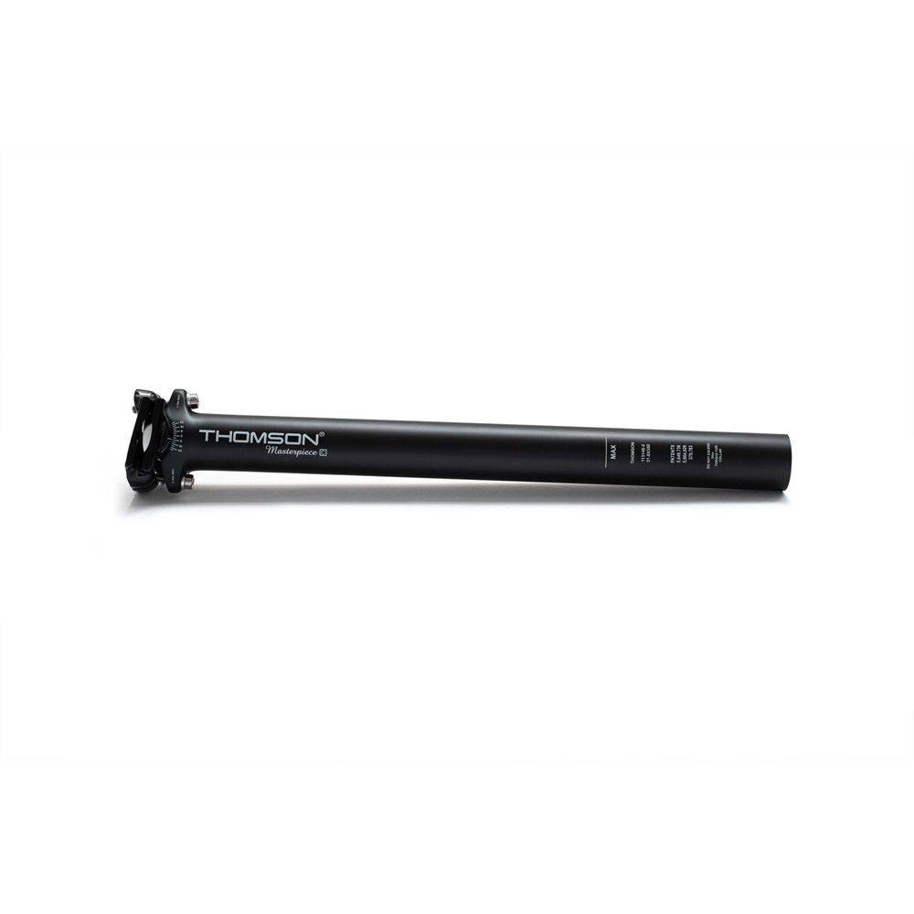 Thomson Masterpiece carbon fiber bicycle seatpost with titanium hardware and alloy clamp, showing sleek design and high-quality materials.