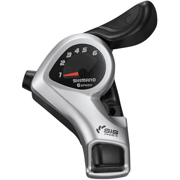 Shimano TX50 MTB shift lever pair for 7-speed drivetrain, Shimano Tourney/TY components, mounted on a mountain bike handlebar
