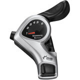 Shimano TX50 MTB shift lever pair for 7-speed drivetrain, Shimano Tourney/TY components, mounted on a mountain bike handlebar