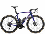 Trek Madone SLR 9 Gen 8 road bike with aerodynamic 900 Series OCLV carbon frame and disc brakes, shown from side view.