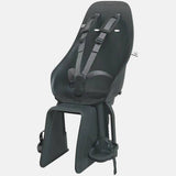 Urban Iki rear bike child seat with easy fix mount, designed for (e)-bikes with pannier rack compatibility, shown on a bicycle.