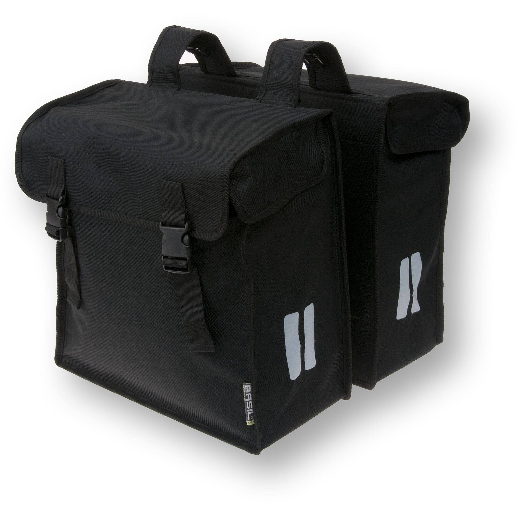 Basil Mara XXL double bike bag in black, water-repellent and reflective, mounted on a bicycle pannier rack for carrying accessories.