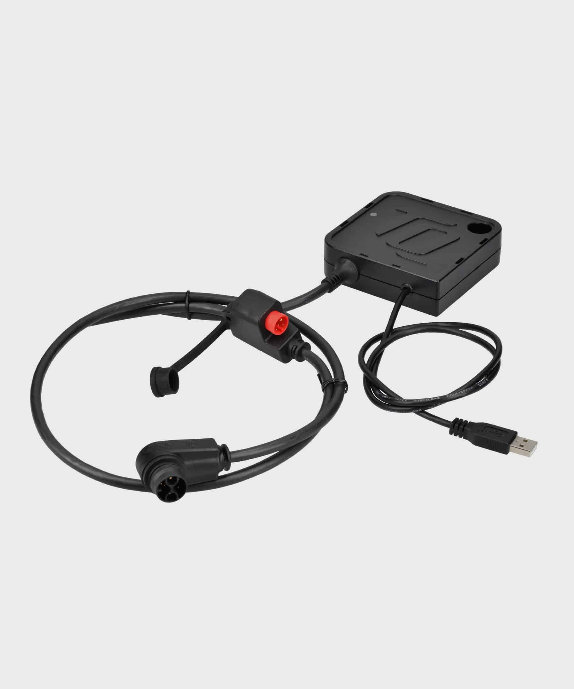 TQ Service Dongle V01 for professional TQ E-Bike diagnostics and maintenance, shown connected to a device.