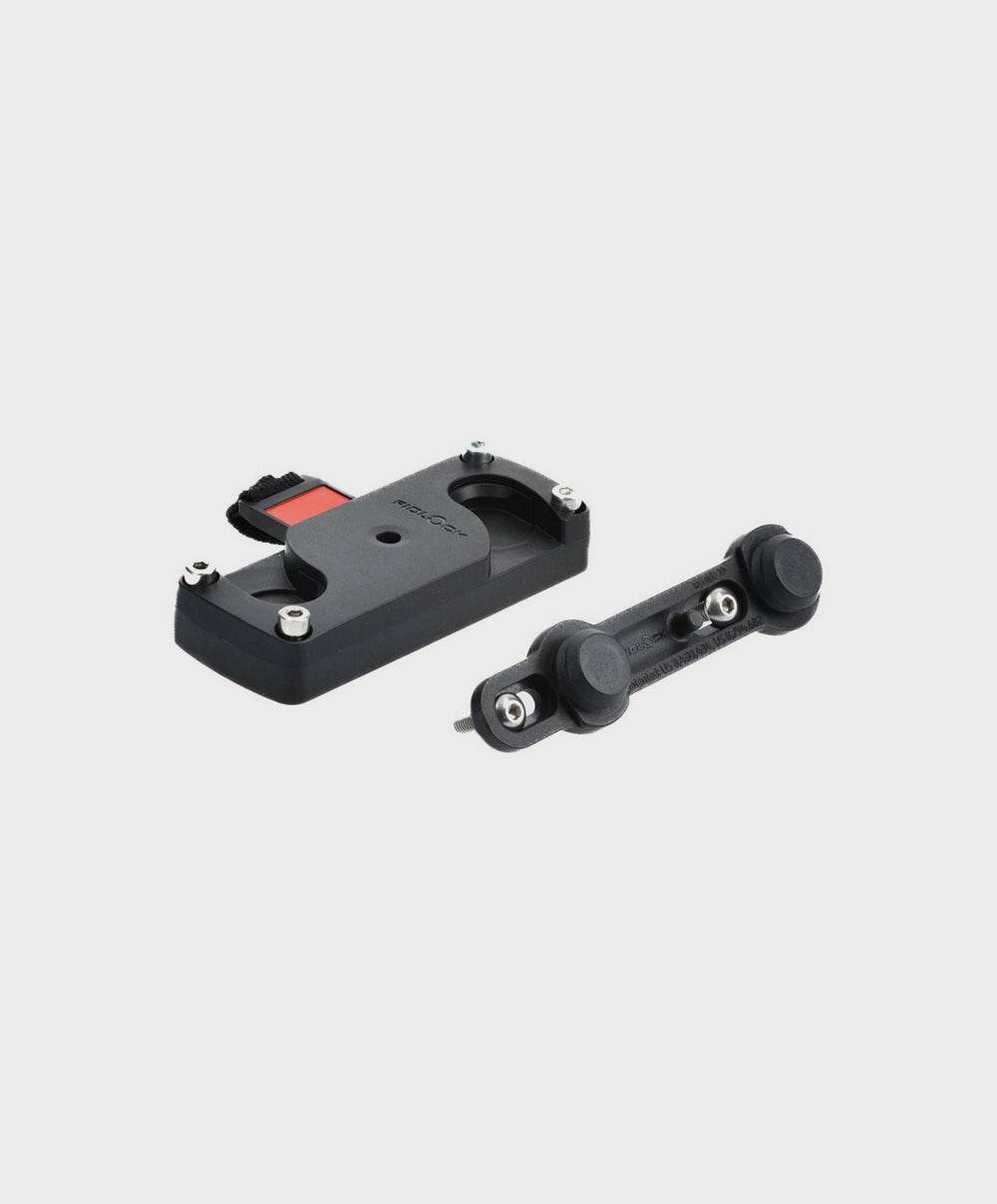 TQ Range Extender Fidlock holder for secure e-bike battery mounting, showing the compact, black component with Fidlock attachment system.