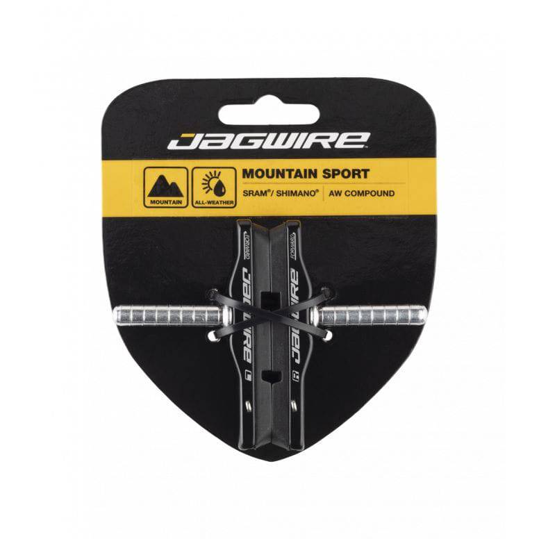 Jagwire Mountain Pro Canti Brake Pads in black for SRAM and Shimano linear pull bike brakes, close-up of brake pad details.