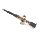 Finish Line grease injection pump gun for bike lubrication, showing a precise workshop tool for maintenance tasks.