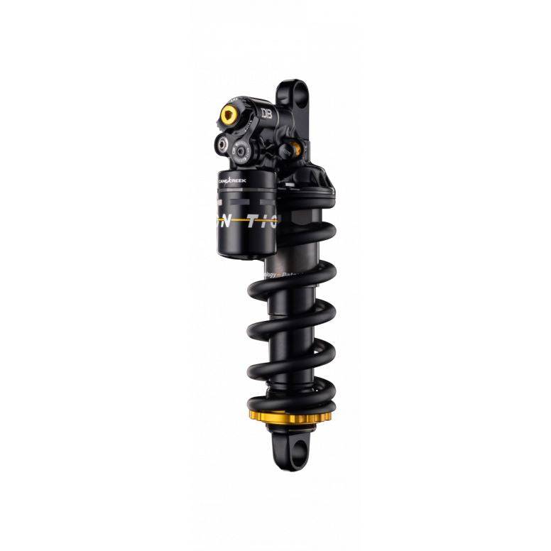 Cane Creek Tigon Coil Rear Shock with RAMP Tube Technology for trail bikes, showing the shock absorber and mounting hardware.