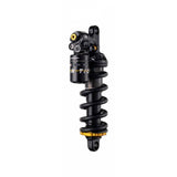 Cane Creek Tigon Coil Rear Shock with RAMP Tube Technology for trail bikes, showing the shock absorber and mounting hardware.