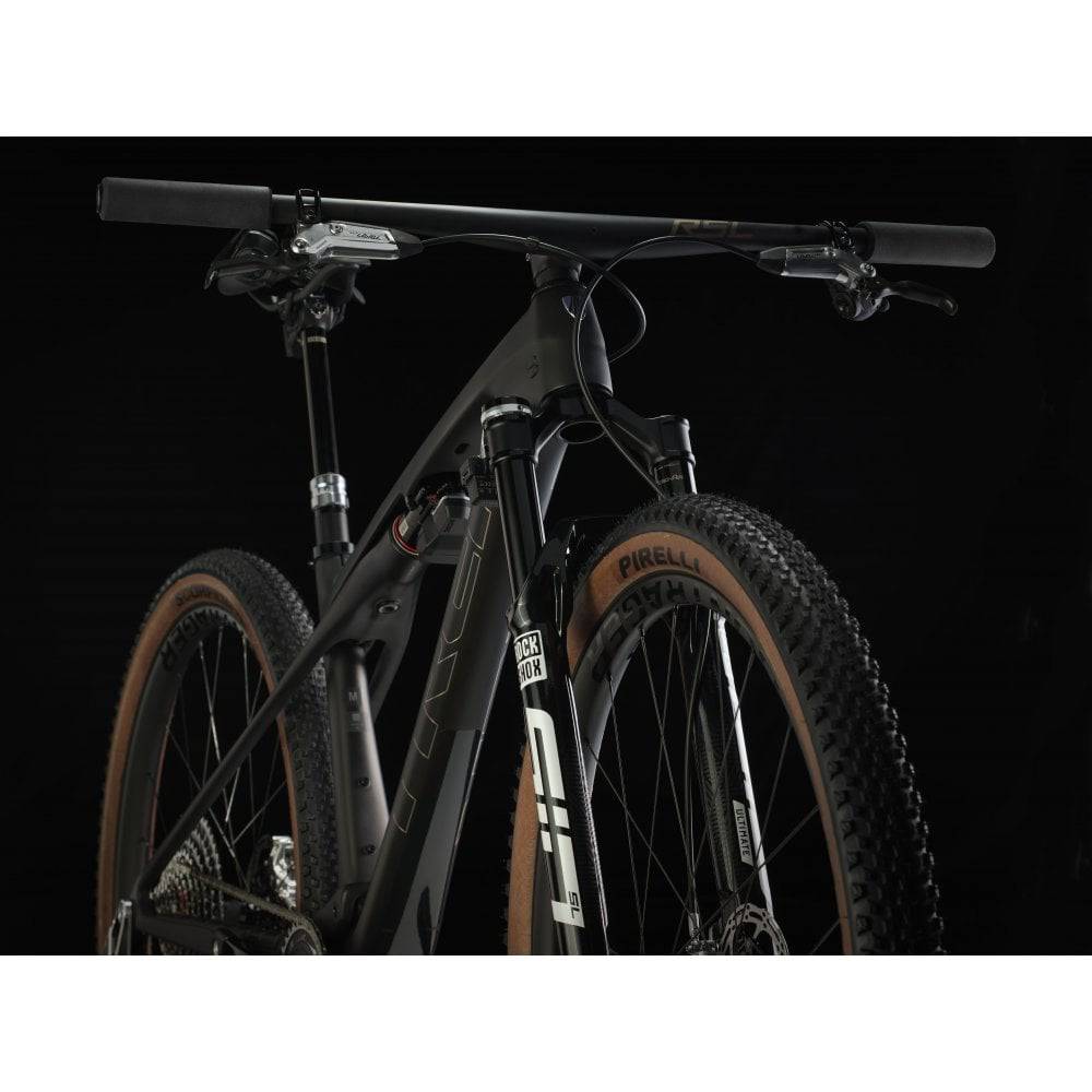 Trek Supercaliber SLR 9.9 Flight Attendant Gen 2 mountain bike for XC racing with sleek frame and high-performance components.
