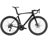 Trek Madone SL 6 Gen 8 road bike with aerodynamic frame and disc brakes, featuring a sleek design and lightweight construction.