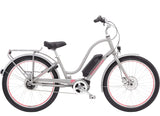 Electra Townie Go! 5i EQ step-thru electric hybrid bike with Bosch Active Line Plus motor, shown with frame and handlebars.