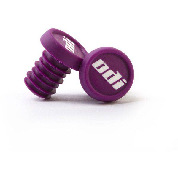 Pair of ODI BMX 2-color push-in handlebar plugs and grips for BMX bike handlebars, showcasing vibrant design and secure fit.