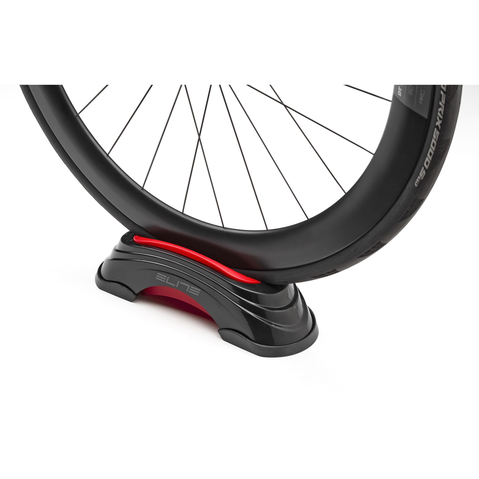Elite Su-Sta adjustable front wheel elevator block for indoor cycling trainers, supporting bike stability and height adjustment.