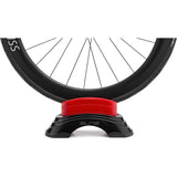 Elite Su-Sta adjustable front wheel elevator block for indoor cycling trainers, supporting bike stability during indoor workouts.