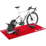 Elite foldable polymer training mat for indoor cycling and home trainers, 180x90cm, showing the textured surface and foldable design.