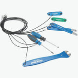 Park Tool THS-1.2 Trailhead Workstation outdoor bike repair station with tools and work surface for bike maintenance.