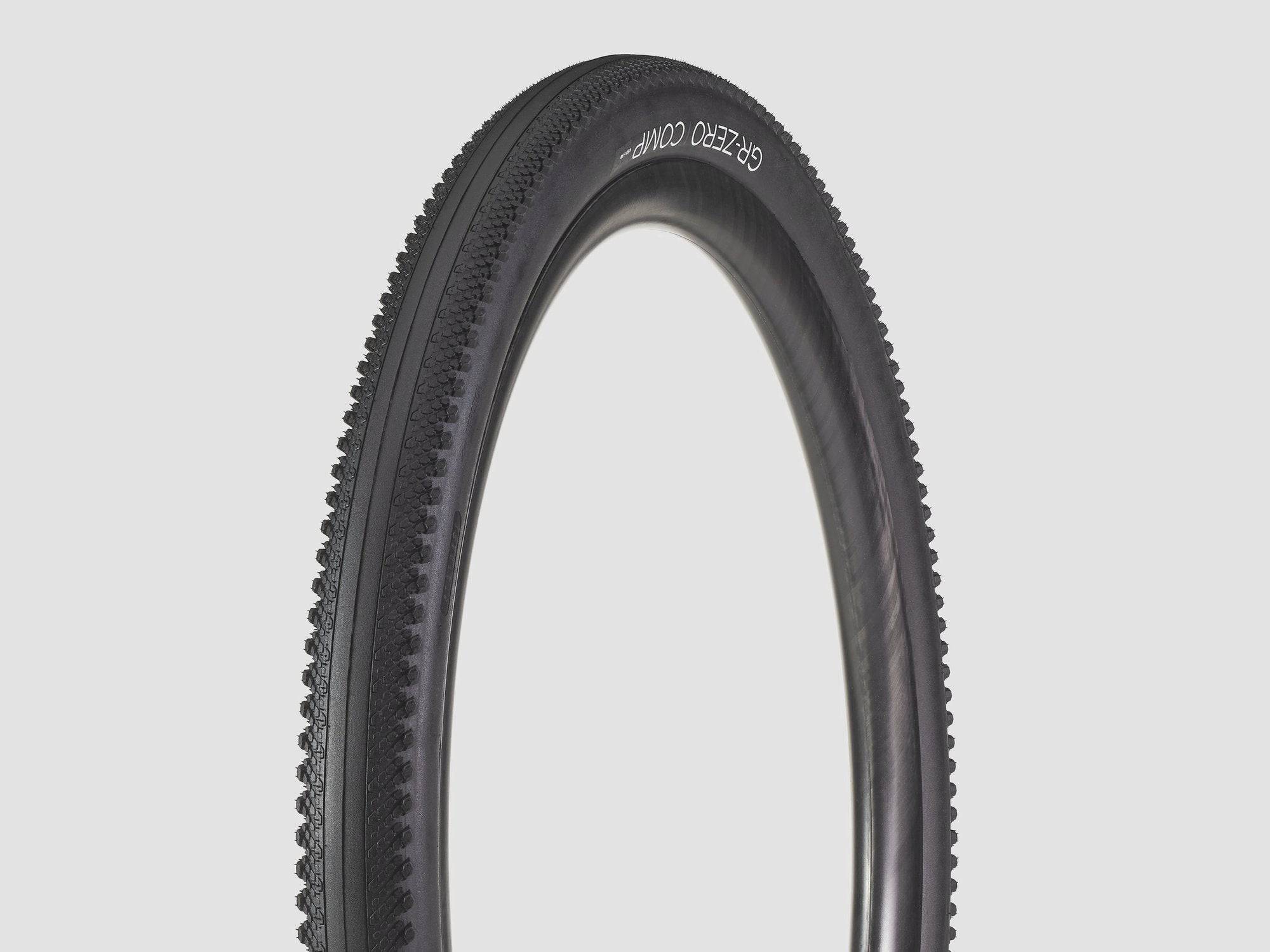 Bontrager GR0 Comp gravel tire in black, 650b x 50mm, tubeless-ready, mounted on a bicycle wheel for gravel riding.
